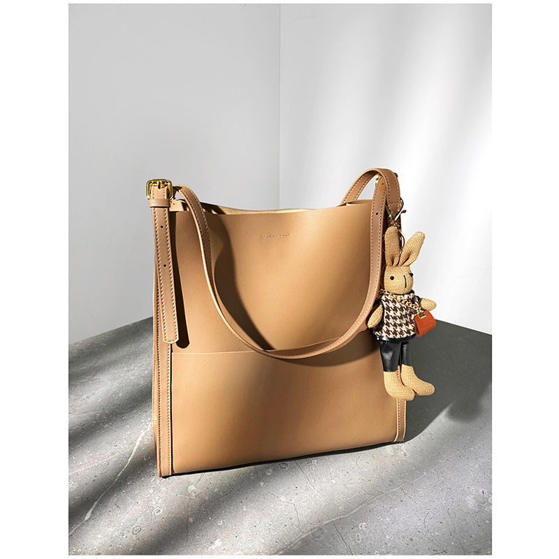 Luxe Cowhide Bucket Bag Elevates High-End Fashion Online - Milk tea