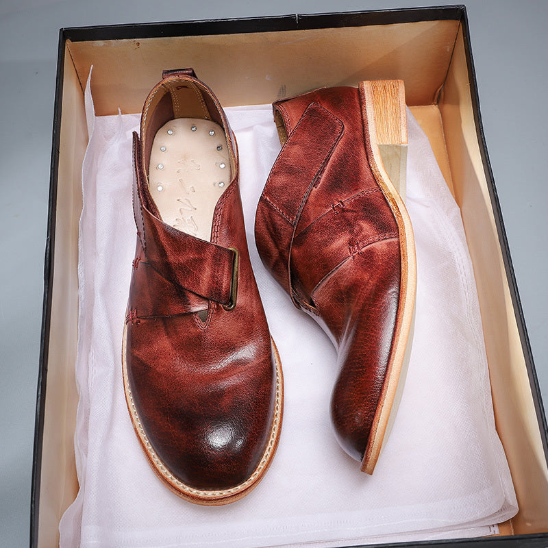 Pair of burgundy leather ankle boots crafted from layer cowhide for luxury fashion for all