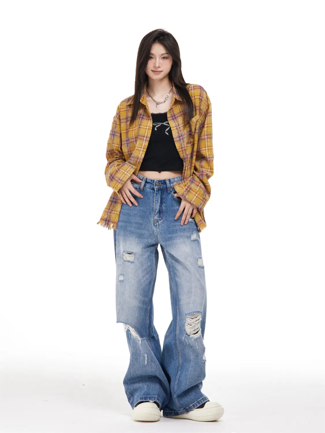Women’s Ripped Washed Blue Jeans