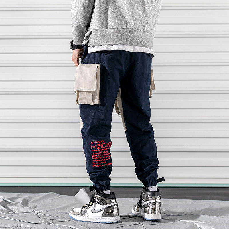 New men’s Japanese loose version of overalls fashion men’s large size stitching casual beam pants