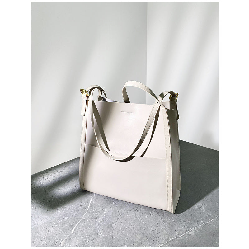 Luxe Cowhide Bucket Bag Elevates High-End Fashion Online - Beige