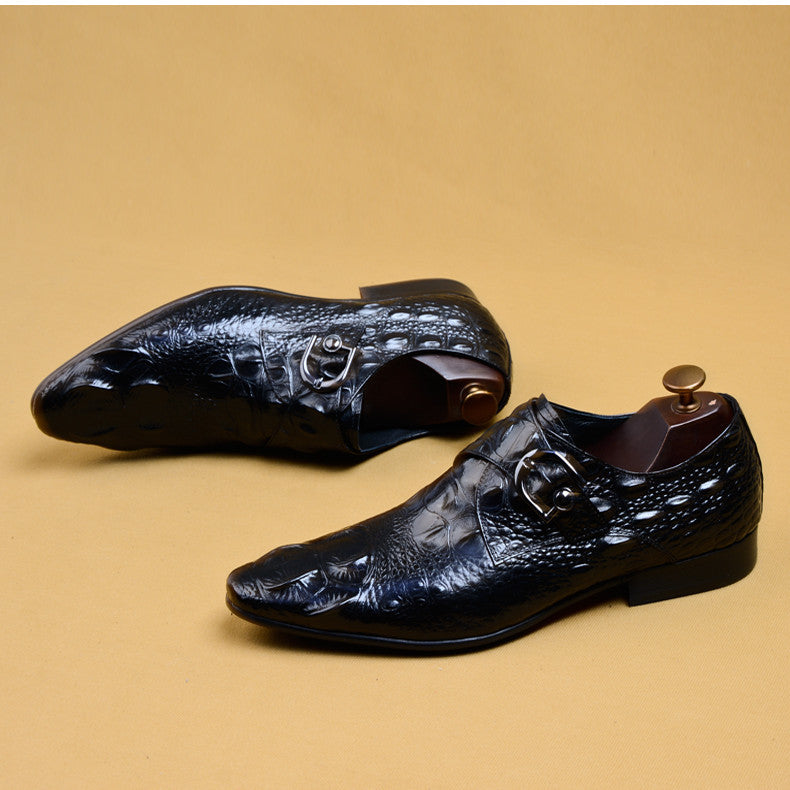 Pair of black crocodile-patterned leather shoes for men’s luxury fashion and elegant style
