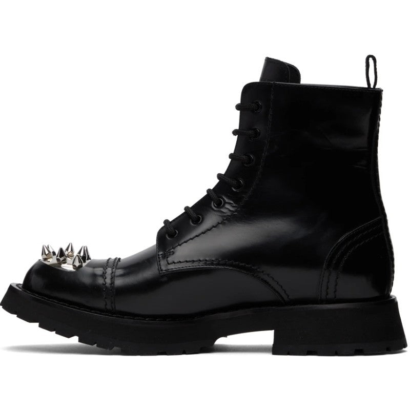 Black leather combat boot with silver spikes, part of luxury fashion for all online