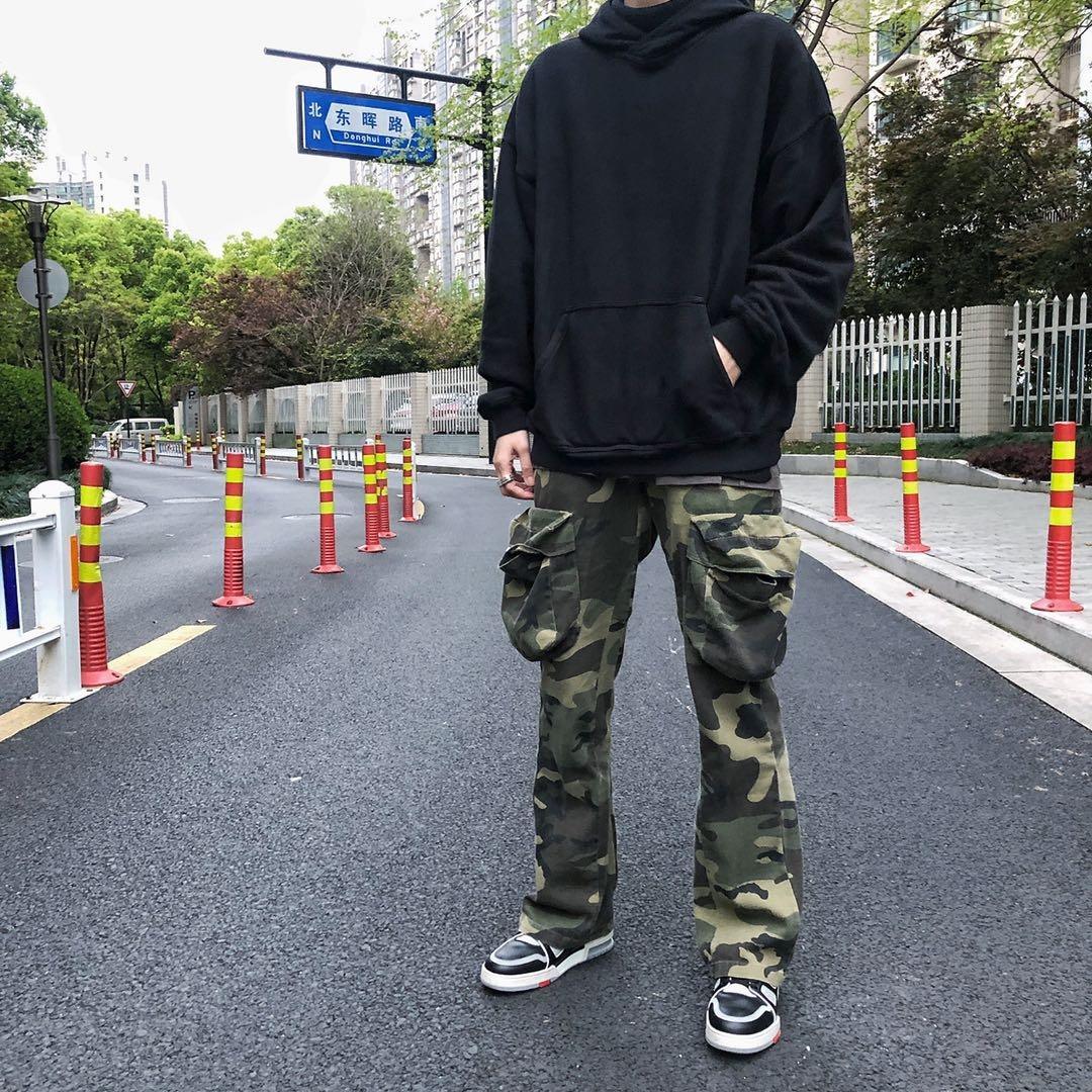 Distressed camouflage overalls