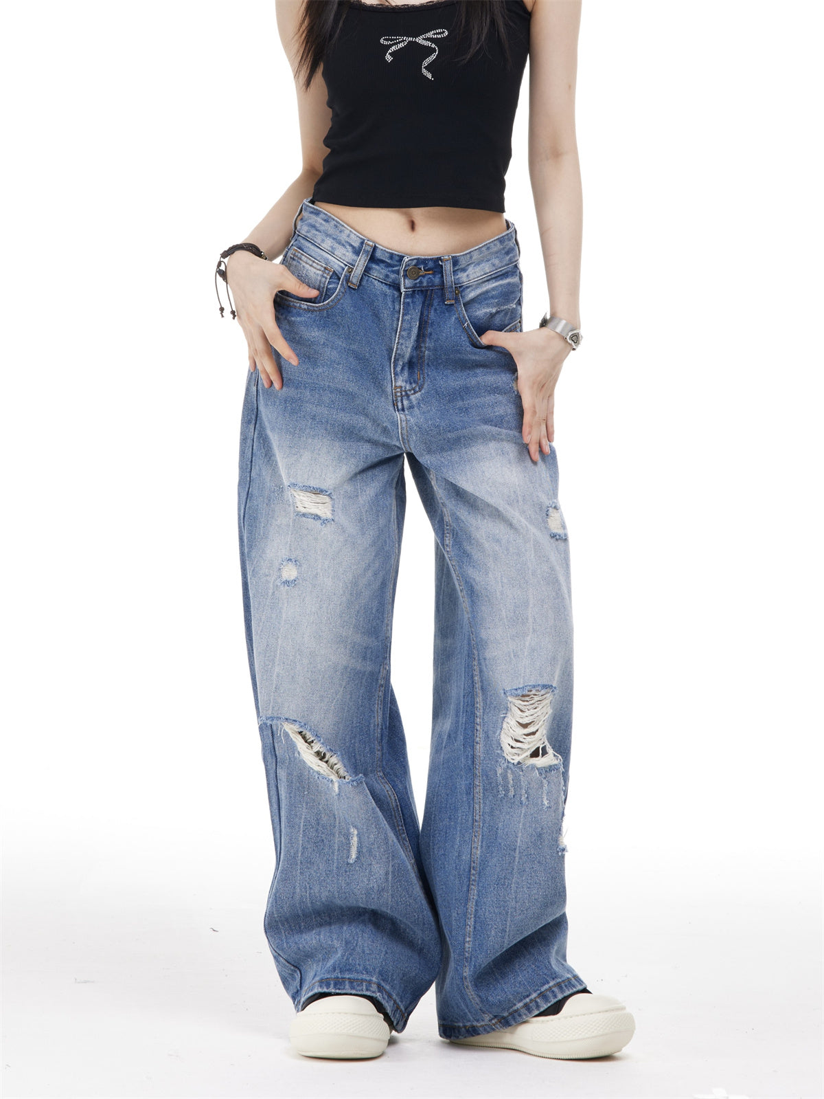 Women’s Ripped Washed Blue Jeans