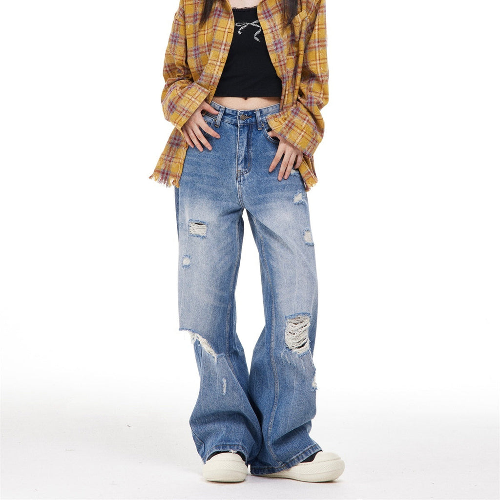 Women’s Ripped Washed Blue Jeans
