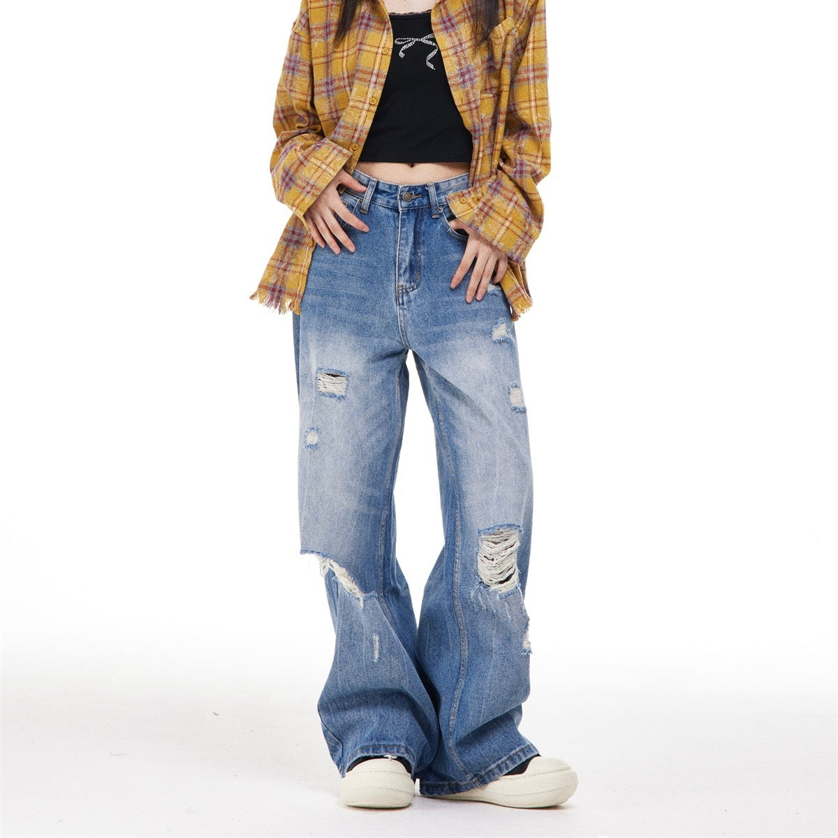 Women’s Ripped Washed Blue Jeans