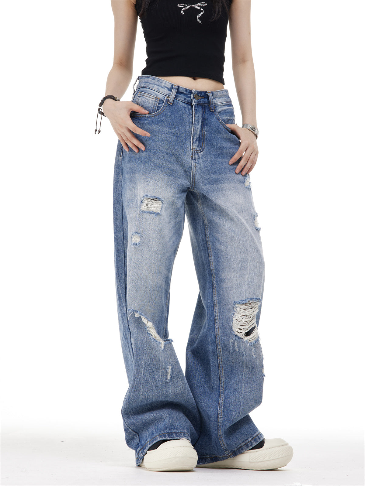 Women’s Ripped Washed Blue Jeans